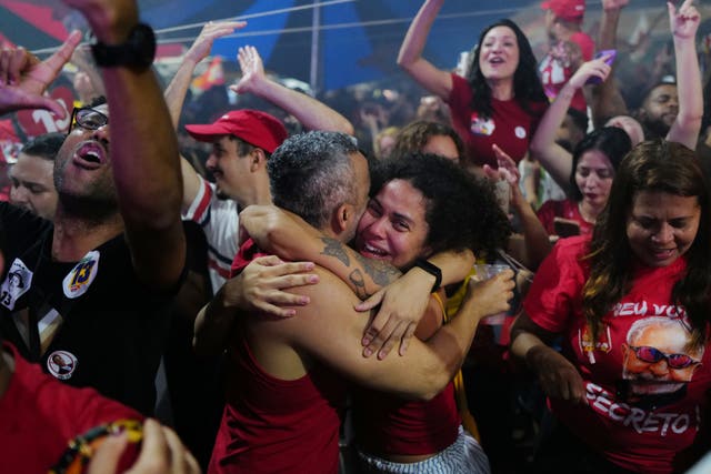 Supporters of President Luiz Inacio Lula da Silva celebrating in Rio de Janeiro after he was announced the winner of the presidential run-off