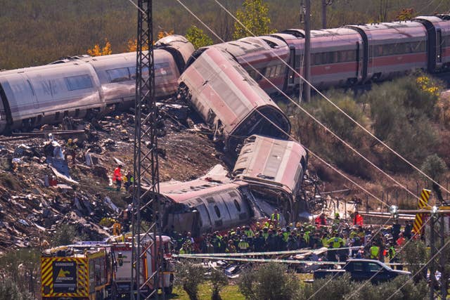 Photos show aftermath of deadly high-speed train collision in Spain
